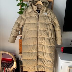 Beige long north face puffer jacket